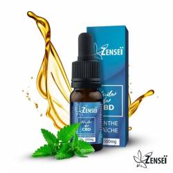 Flacon d'huile de CBD Zenseï "Menthe Fraiche" 5% avec sa feuille de menthe et une représentation de l'huile en arrière plan